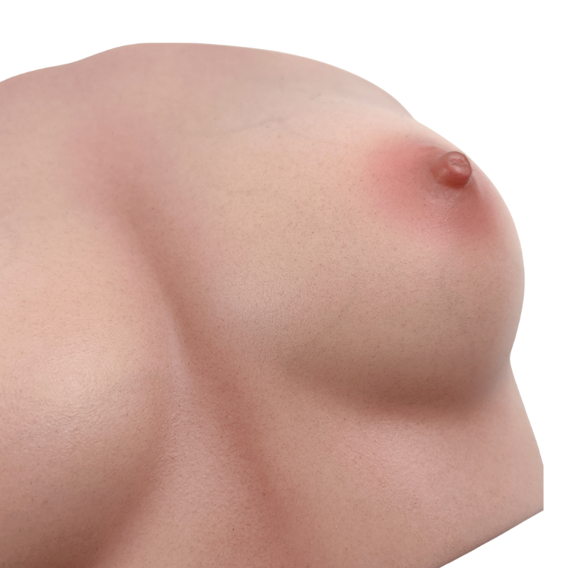 Realistic silicone breast with natural skin texture and detailed nipple, designed for intimate pleasure.
