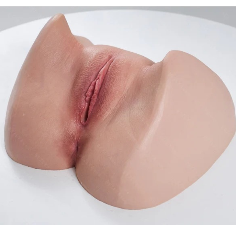 Realistic flesh-toned male masturbator with detailed labia and natural skin texture