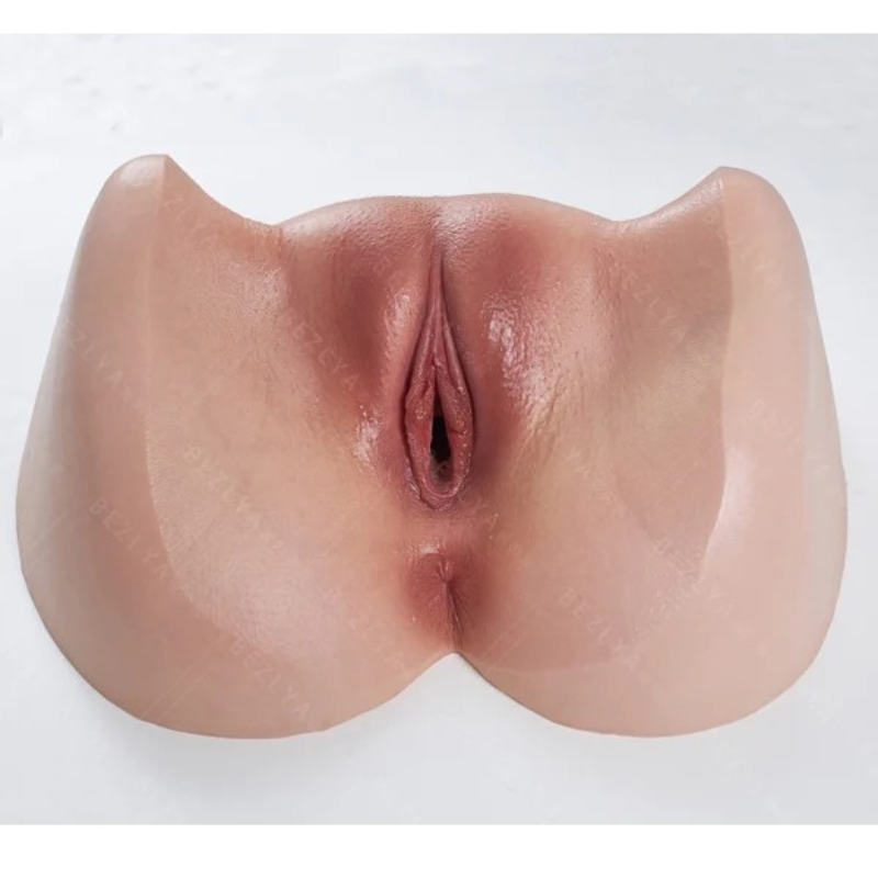 Realistic silicone male masturbator with detailed vulva texture and natural skin tone