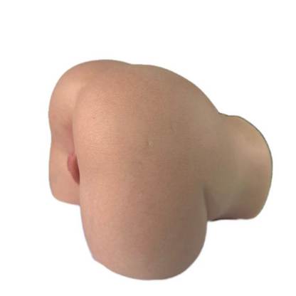 Realistic flesh-toned male masturbator with smooth texture and natural curves, designed for intimate pleasure.