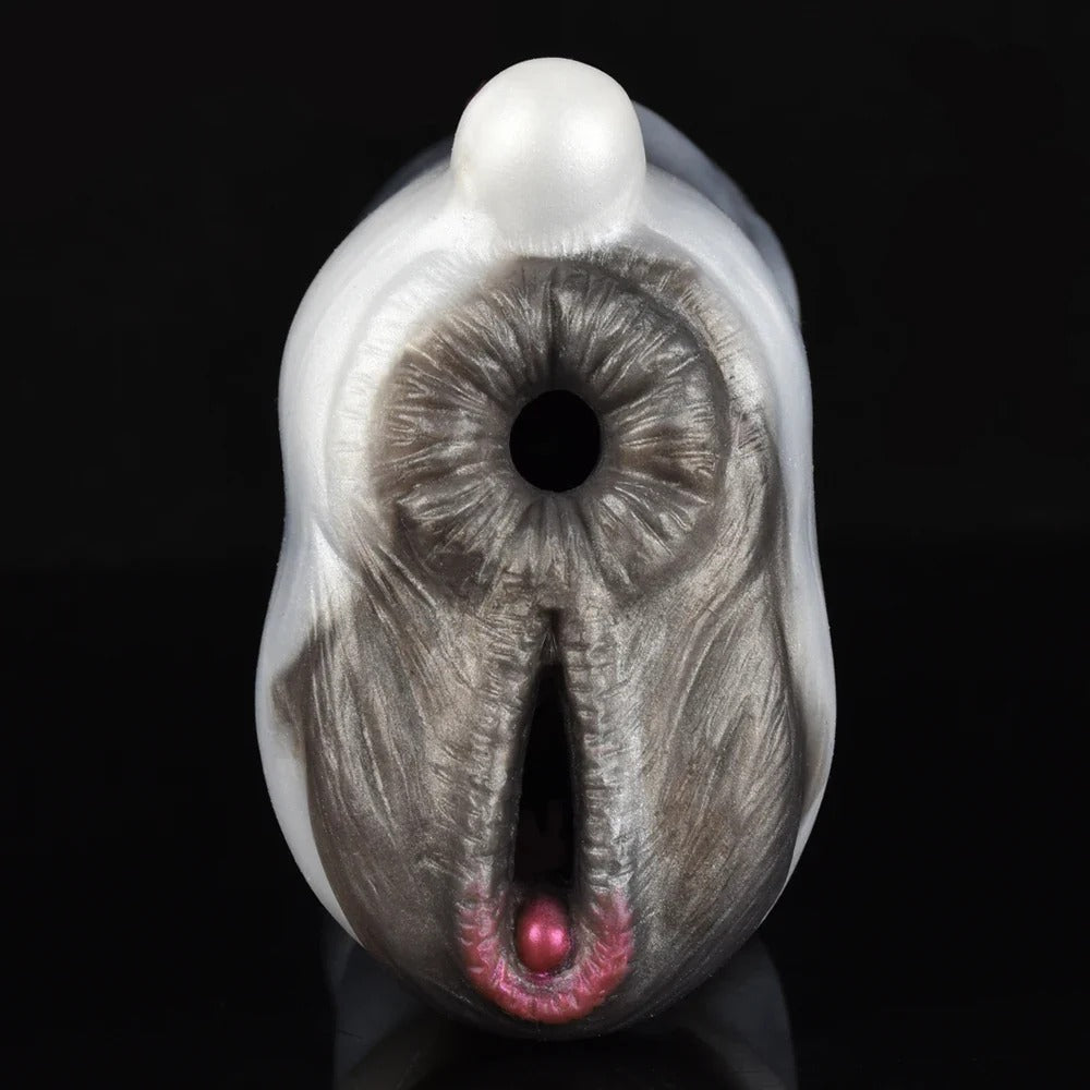 Realistic male masturbator with detailed textured interior, pink accents, and smooth white exterior