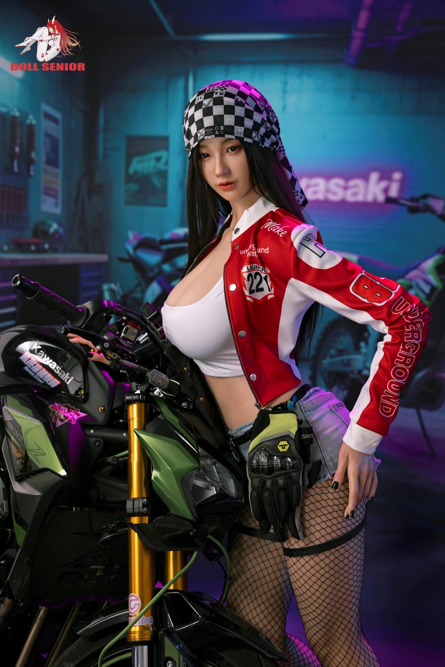 Realistic female doll in red racing jacket, fishnet stockings, posing beside green Kawasaki motorcycle in garage