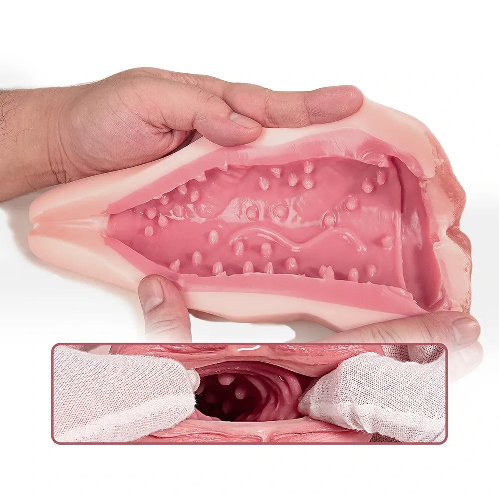 Realistic pink silicone male masturbator with textured interior and ribbed tunnel design