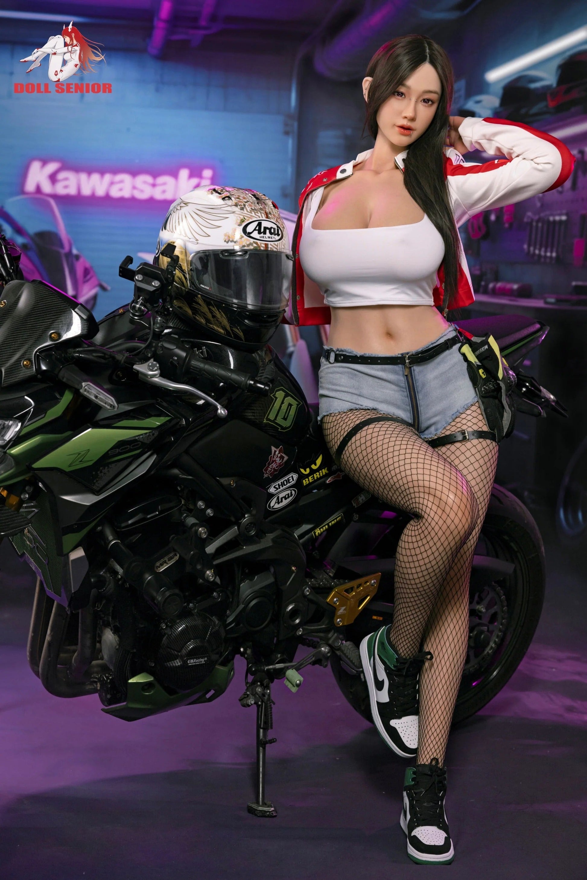 Realistic female doll in white crop top, denim shorts, and fishnet stockings posing beside a green Kawasaki Z900 motorcycle in a neon-lit garage.