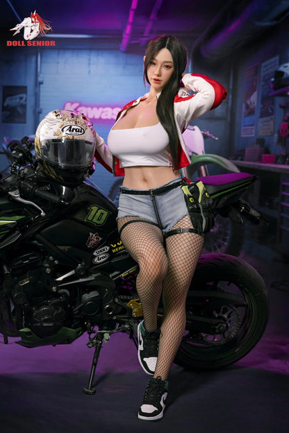 Realistic female figure in racer outfit posing beside motorcycle, wearing fishnet stockings and denim shorts