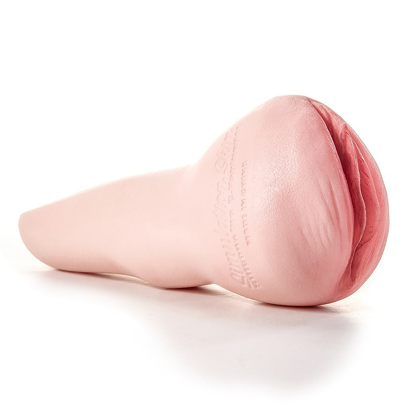 Realistic pink silicone male masturbator with detailed vaginal texture and tapered design