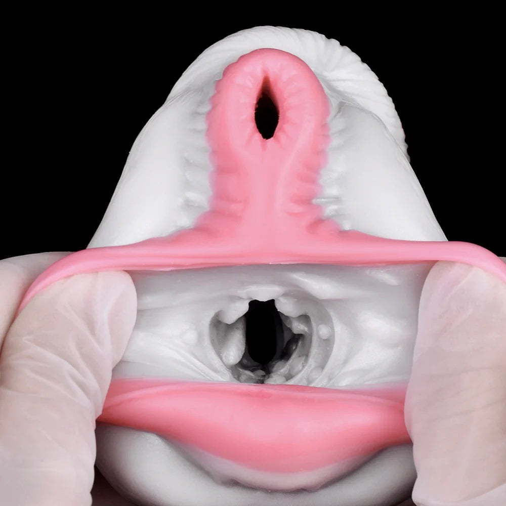 Realistic pink and white male masturbator with detailed vaginal and anal openings, soft textured material
