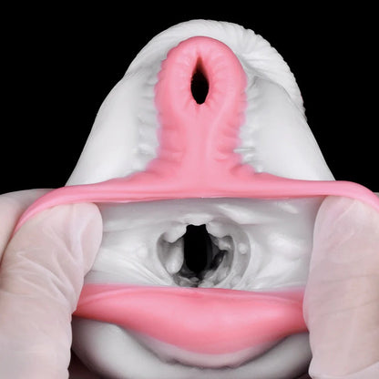 Realistic pink and white male masturbator with detailed vaginal and anal openings, soft textured material