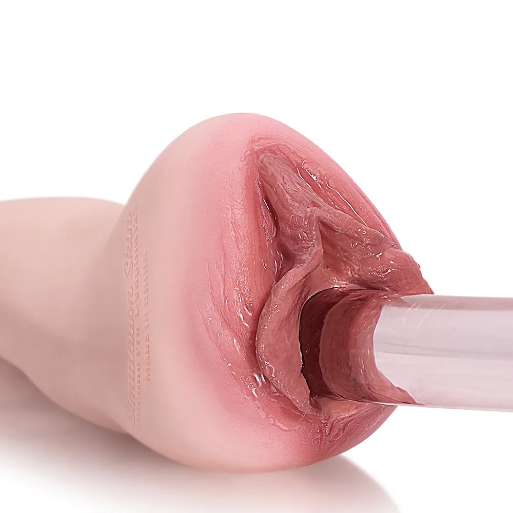 Realistic pink silicone male masturbator with detailed vaginal texture and clear inner tunnel