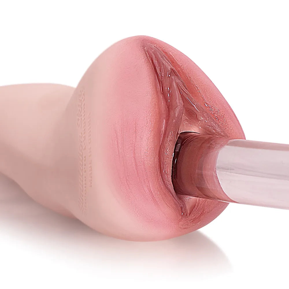 Realistic pink silicone male masturbator with detailed vaginal texture and clear inner tunnel