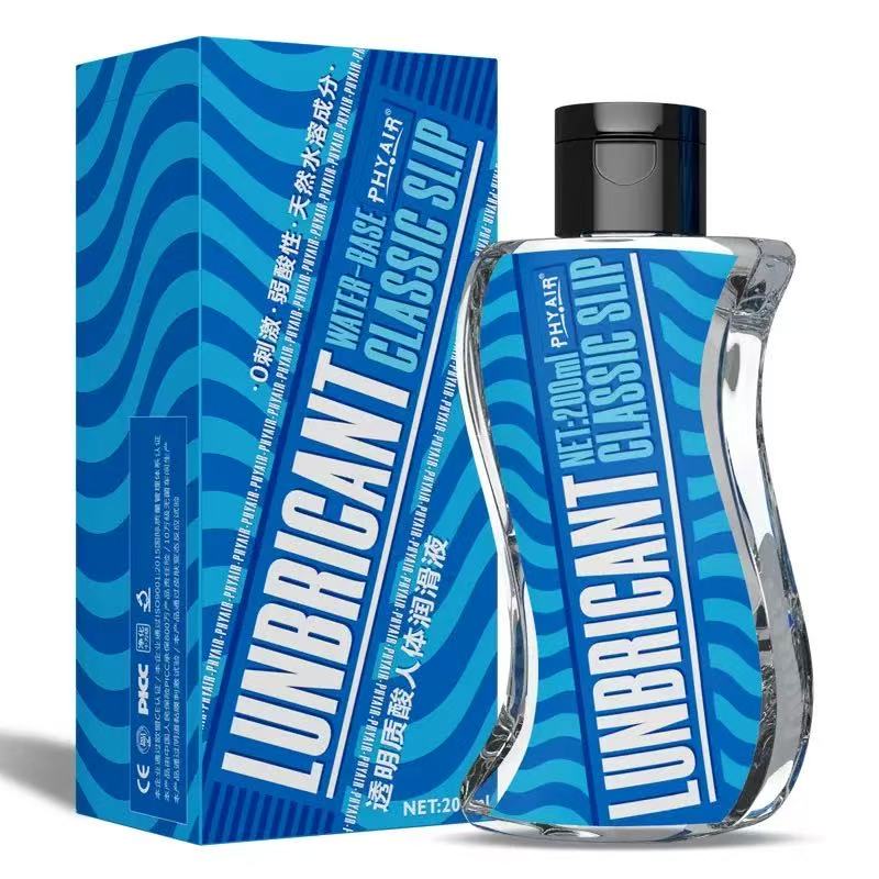 Clear water-based lubricant in curved glass bottle with blue wave label, 200ml