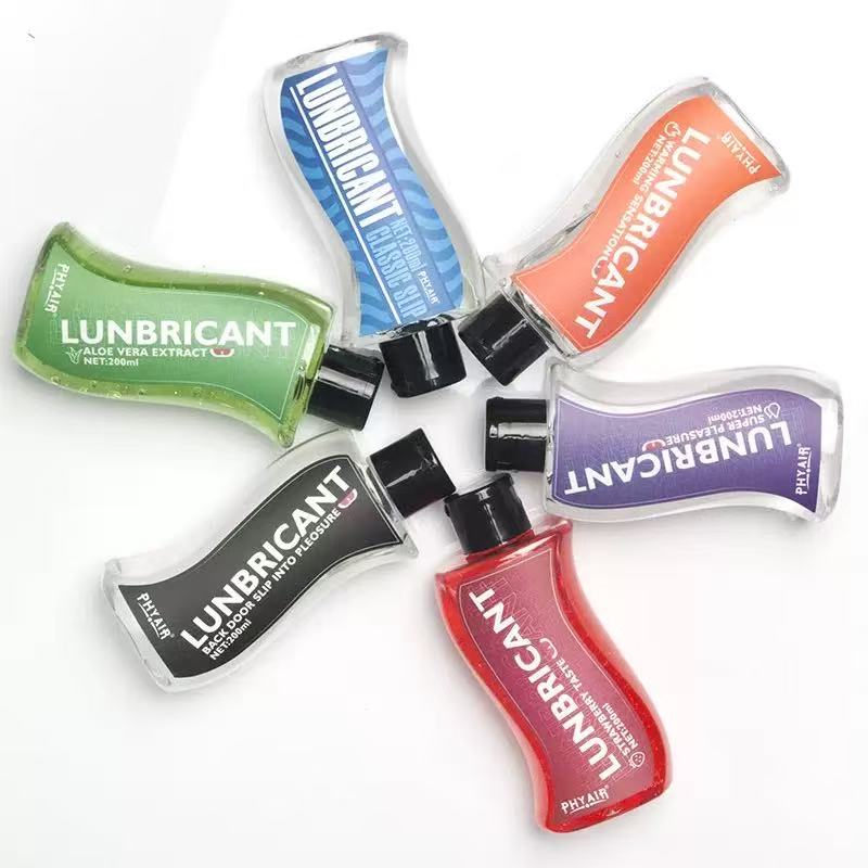 Five colorful LUNBRICANT bottles with unique flavors and textures, designed for enhanced pleasure and smooth glide.