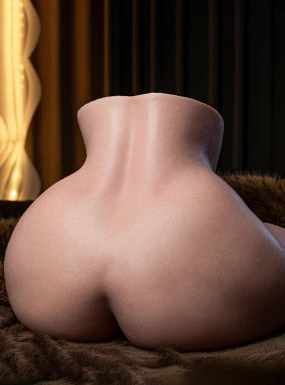 Realistic silicone male masturbator with lifelike curves, smooth skin texture, and natural flesh tone