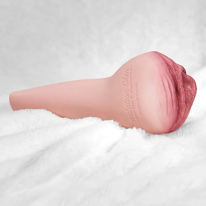 Realistic pink male masturbator with textured vaginal opening and simulation skin material, resting on white fur