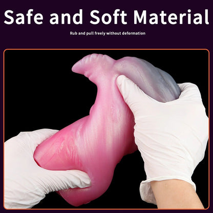 Pink realistic male masturbator with soft, stretchy material being gently squeezed by gloved hands