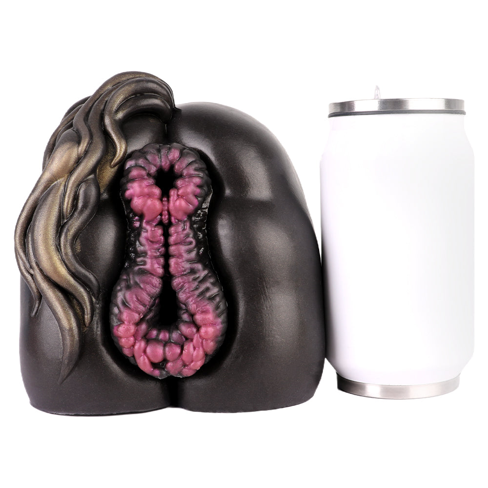 Realistic male masturbator with textured pink interior and dark exterior, shown beside a can for scale