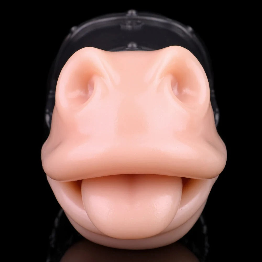 Realistic flesh-toned male masturbator with detailed labia and tongue, encased in clear plastic base